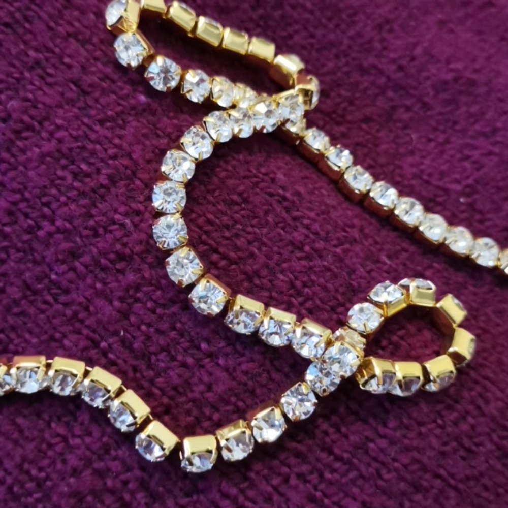 Gold tone diamond studded necklace